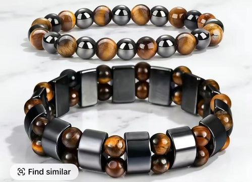 Green Aventurine and Tiger Eye money bracelet arranged in circle on dark wood